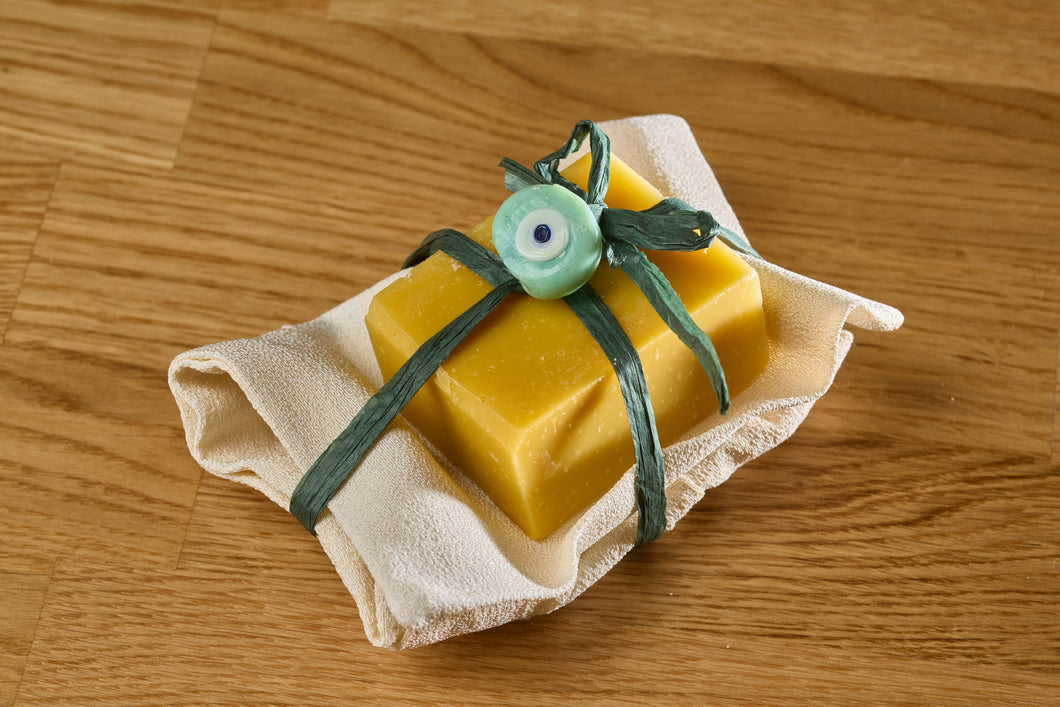 Guanto esfoliante con sapone